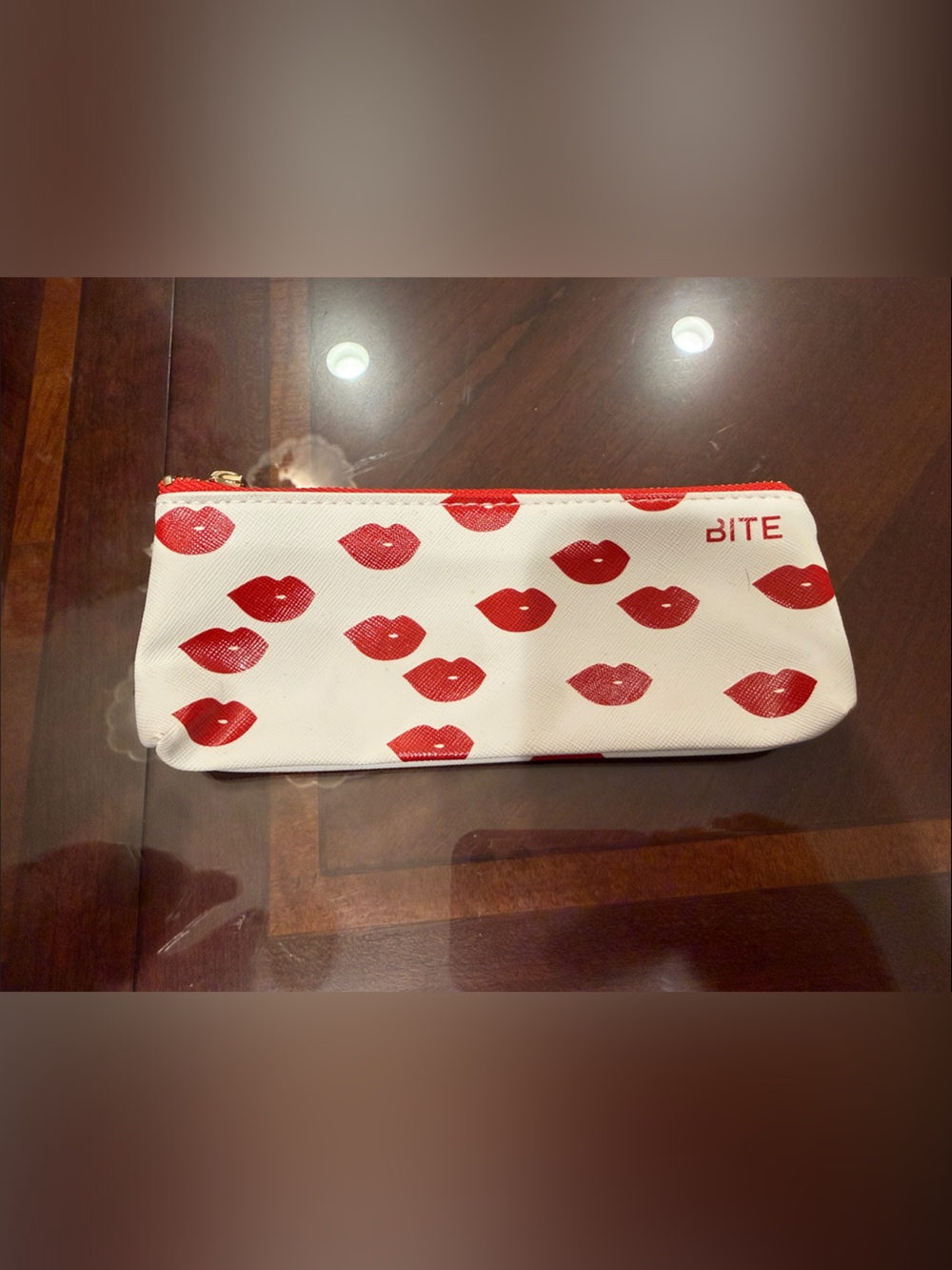 Bite Beauty White Cosmetic Pouch with Red Lip Print